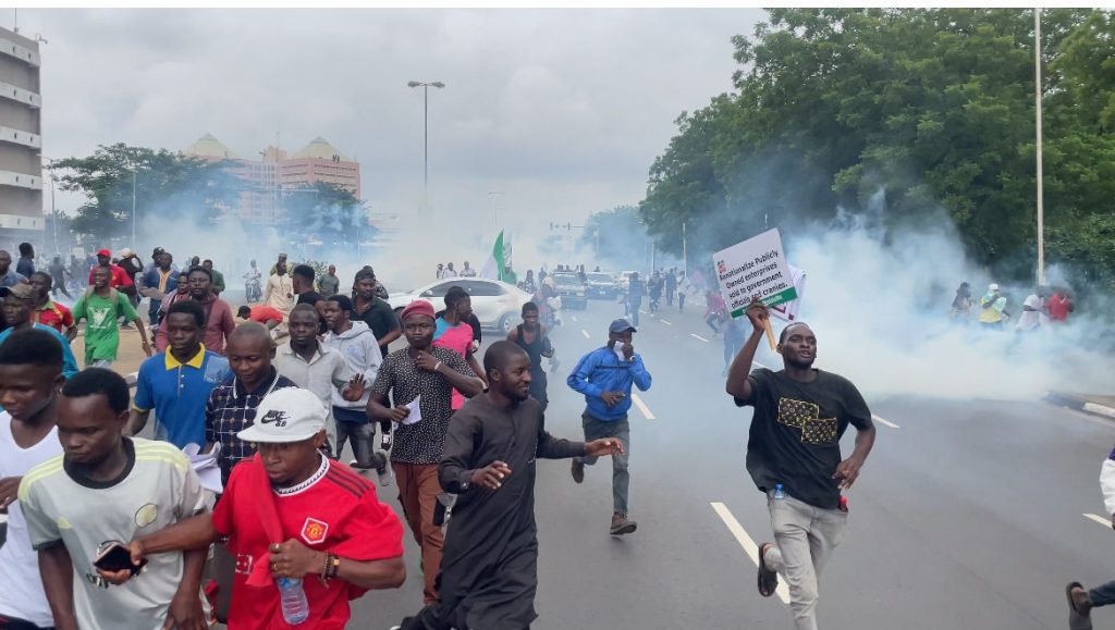 Tensions Flare in Abuja as Police Disperse Peaceful Protesters with Tear Gas